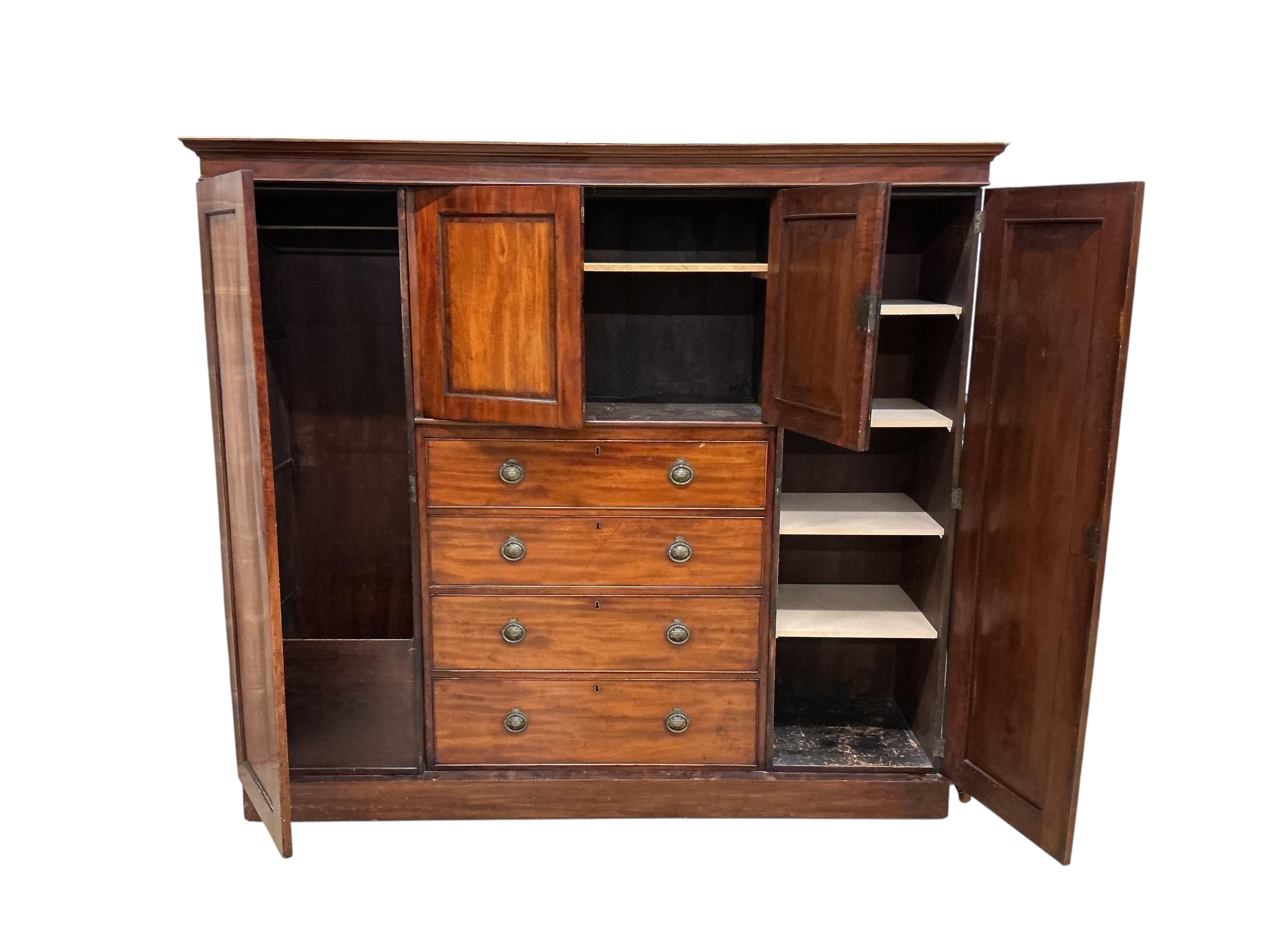 A Victorian mahogany compactum wardrobe, width 188cm, depth 52cm, height 170cm